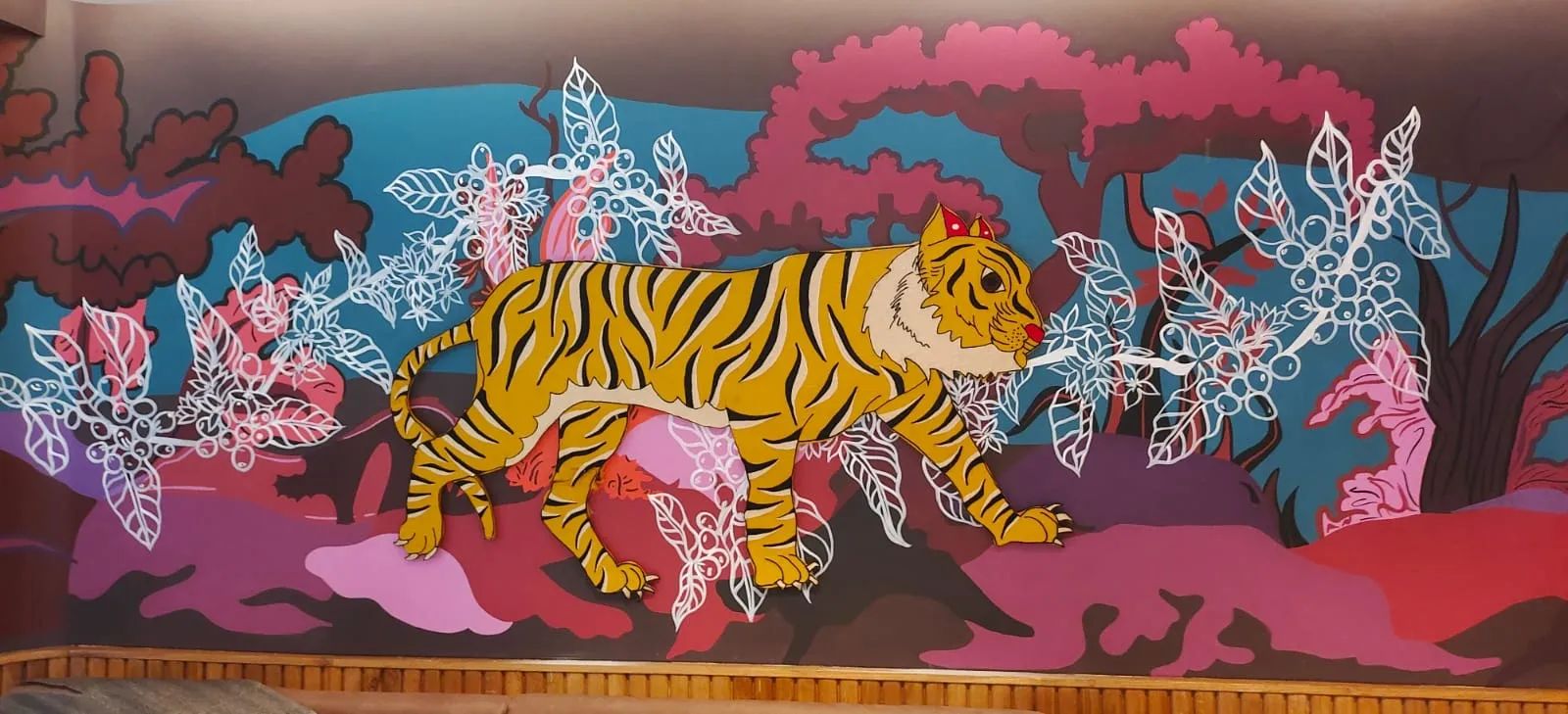 The coffee-jungle mural at Starbucks Indiranagar, Bengaluru